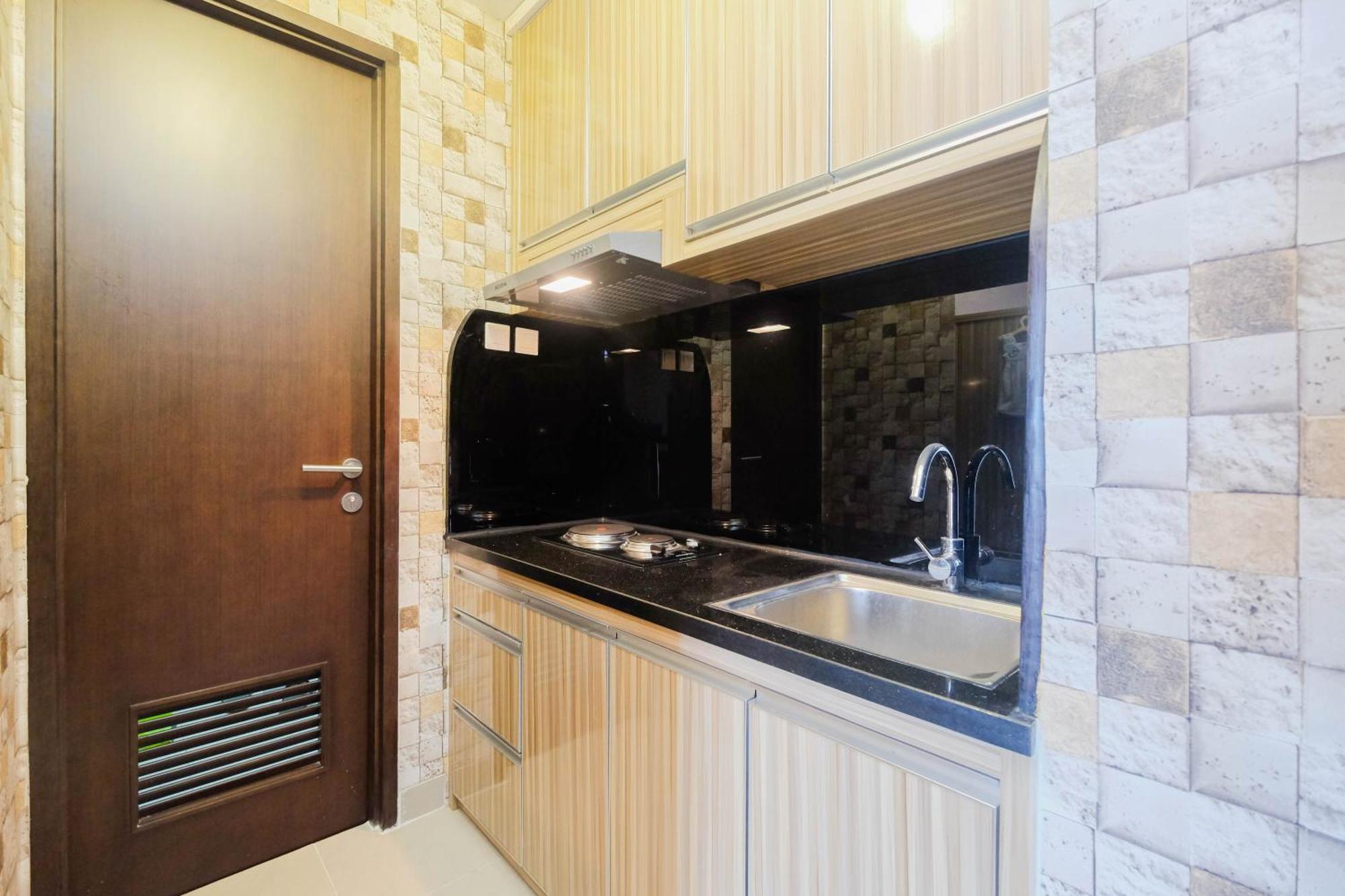 Cozy 1br With Workspace At Mustika Golf By Travelio Bekasi